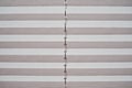 White textile accordion curtain blinds for window Royalty Free Stock Photo