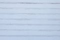 White texture of a painted wooden wall from slats