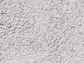White Texture Rough Cast Plaster. White wall decorated with coarse cement plaster