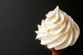 White texture of Vanilla ice cream with whipped cream on a stick on a black background. Detailed pure creamy background Royalty Free Stock Photo