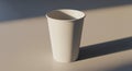 White Textured Paper Cup Centered Under Direct Sunlight on White Surface Plain Background Royalty Free Stock Photo