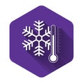 White Thermometer with snowflake icon isolated with long shadow. Purple hexagon button Royalty Free Stock Photo