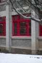 White thick snow on the ground, red beautiful Chinese-style windows