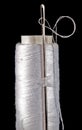 White thread bobbin