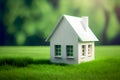A white tiny house model on green grass Royalty Free Stock Photo