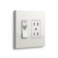 White Light Switch and Electrical Outlet on a White Wall power socket toggle switch Royalty Free Stock Photo