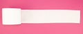 White toilet paper roll on pink background Royalty Free Stock Photo