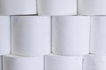 White toilet paper rolls stack on top of each other. Royalty Free Stock Photo