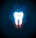 White tooth on a blury blue background Royalty Free Stock Photo