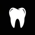 White tooth silhouette on a black background. The tooth shape is simplified with smooth contours, Royalty Free Stock Photo