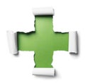 White torn paper with plus shape over green Royalty Free Stock Photo