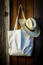 White tote bag with hat hanging on wooden door handle. Generative AI Royalty Free Stock Photo