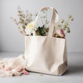 White tote bag mockup with flowers.