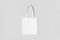 White tote bag mockup on a grey background