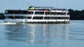 White tour boat on the blue Danube with blue sky above Royalty Free Stock Photo