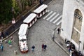 White tourist street train on cobbled street. Paris, France. March 31, 2023.