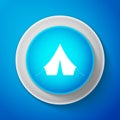 White Tourist tent icon isolated on blue background. Circle blue button with white line. Vector