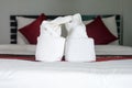 White towel on bed,Stack of plush hotel towels Royalty Free Stock Photo