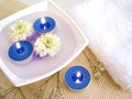 White towel, blue candles Royalty Free Stock Photo