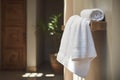 A white towel hangs on the wall in the bathroom Royalty Free Stock Photo