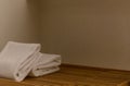 White towel on wooden board in bathroom. hygiene, shower, bath, freshness concept Royalty Free Stock Photo