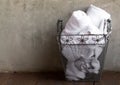 White towels in metal basket