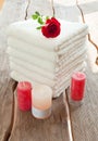 White towels and rose candles