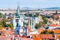 White tower of All Saints Church near main Peace square, Litomerice, Czech Republic