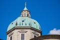 White tower,green roof,gold cross on top Royalty Free Stock Photo