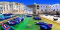 white town Monopoli with colorful fishinng boats