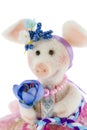 White toy pig in a pink skirt Royalty Free Stock Photo