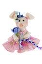 White toy pig in a pink skirt Royalty Free Stock Photo