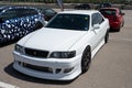 White Toyota Chaser sports car parked on the street