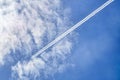 Jet airplanes flying with contrails short condensation trails