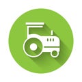 White Tractor icon isolated with long shadow background. Green circle button. Vector Royalty Free Stock Photo