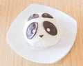 White traditional Chinese panda bear dumpling on desert plate