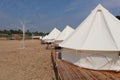 White traditional teepee tent on the beach. Royalty Free Stock Photo