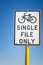 White Traffic Sign on a Cycle Lane Royalty Free Stock Photo