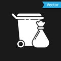 White Trash can and garbage bag icon isolated on black background. Garbage bin sign. Recycle basket icon. Office trash