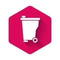 White Trash can icon isolated with long shadow. Garbage bin sign. Recycle basket icon. Office trash icon. Pink hexagon