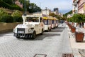 The white travel vehicle travels during the tour Royalty Free Stock Photo