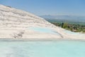 White travertine terrace cascade with turquoise blue lakes Royalty Free Stock Photo