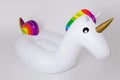 White, trendy, blown beach unicorn on a white background. Hit the summer