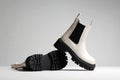 White Trendy boots. fashion female shoes still life