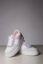 White trendy sneakers. fashion shoes still life. gumshoes