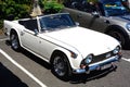 White Triumph TR5 car.