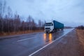 White truck on a road in early morning Royalty Free Stock Photo