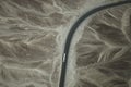 A white truck runs on the pan-American Highway through Nazca desert in Peru. Royalty Free Stock Photo