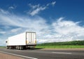 White truck speeding away on highway Royalty Free Stock Photo