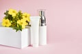 White tubes for cosmetic products. Blank plastic container for cream, lotion, toothpaste, nourishing or moisturizing mask on a pin